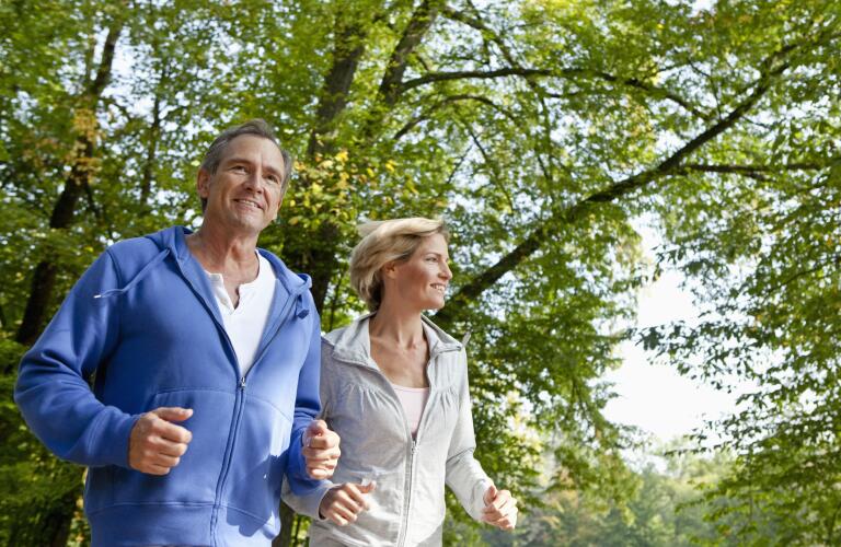 Mature couple exercising
