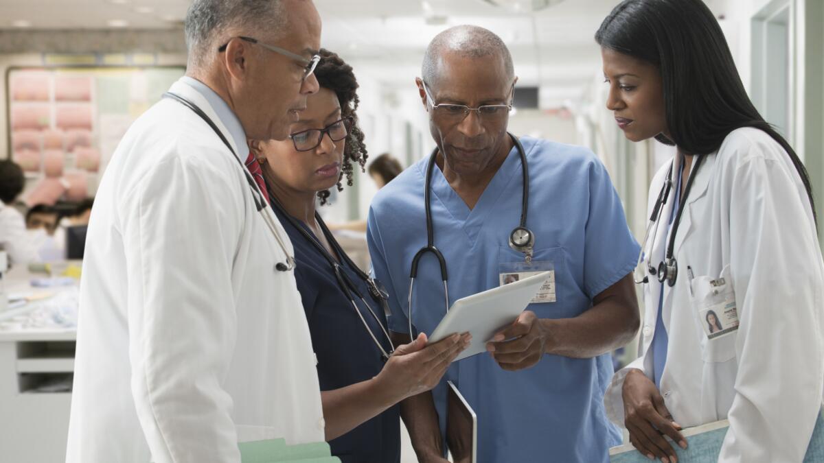 What Does An Attending Physician Do? | Attending Physician Vs. Resident -  Healthgrades
