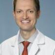Dr. Jonathan Romak, MD
