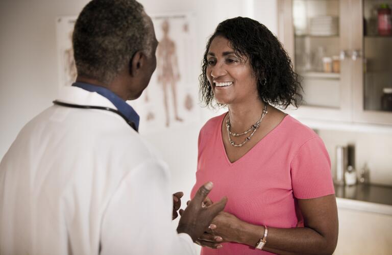 Woman Talking to Doctor