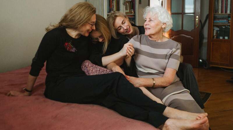 Three generations of females sitting together