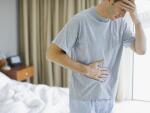 man-with-stomachache-and-headache