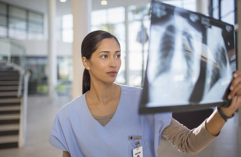 doctor-reviewing-xray-in-hospital