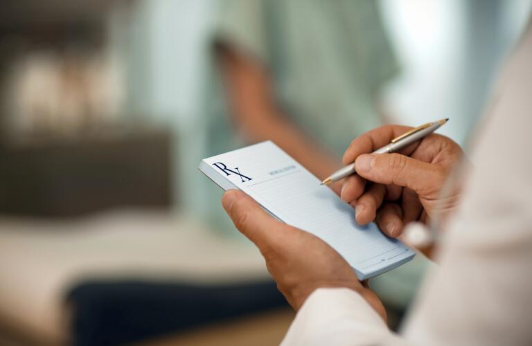 Doctor Writing Medical Prescription