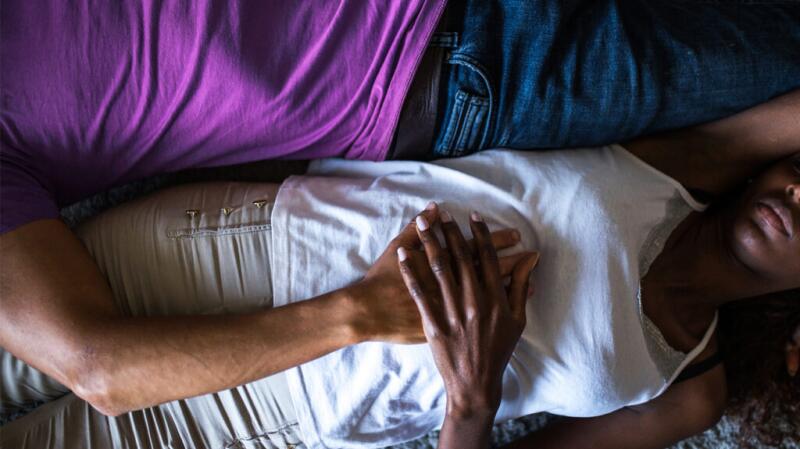 Early pregnant woman holding her belly