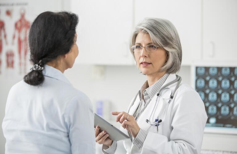 Woman with doctor