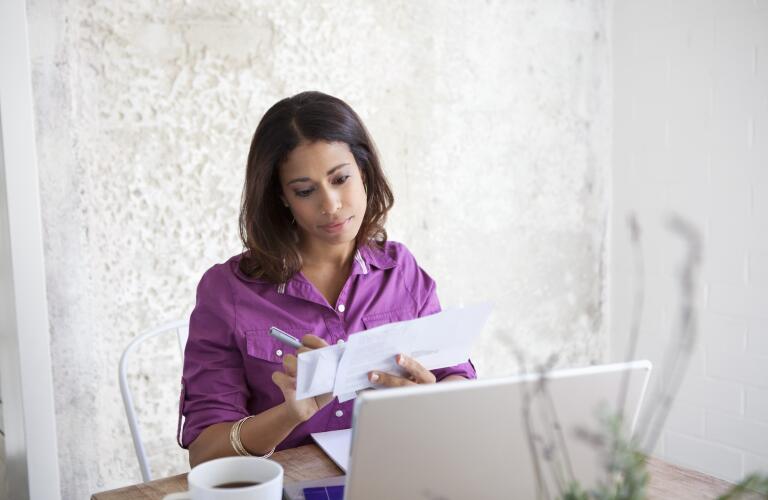 woman-paying-bills