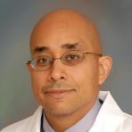 Dr. Miguel Flores, MD