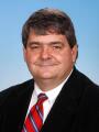 Photo: Dr. Claude Woollen, MD