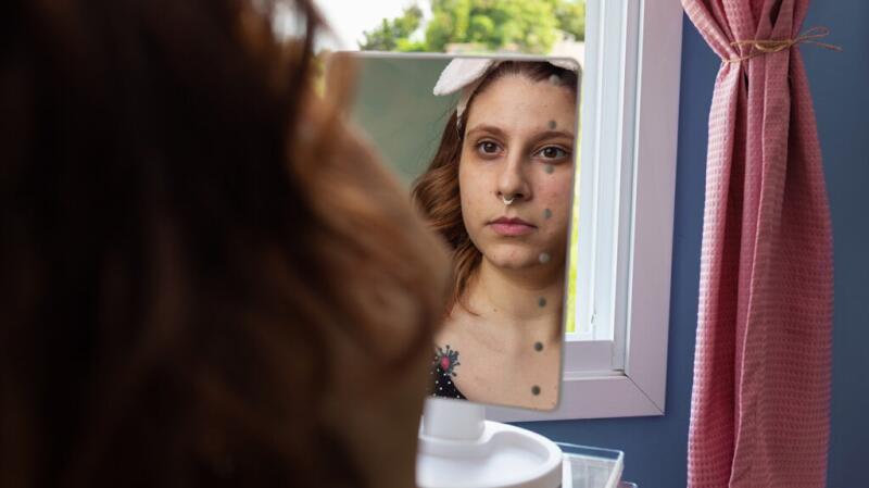 Female looking in the mirror