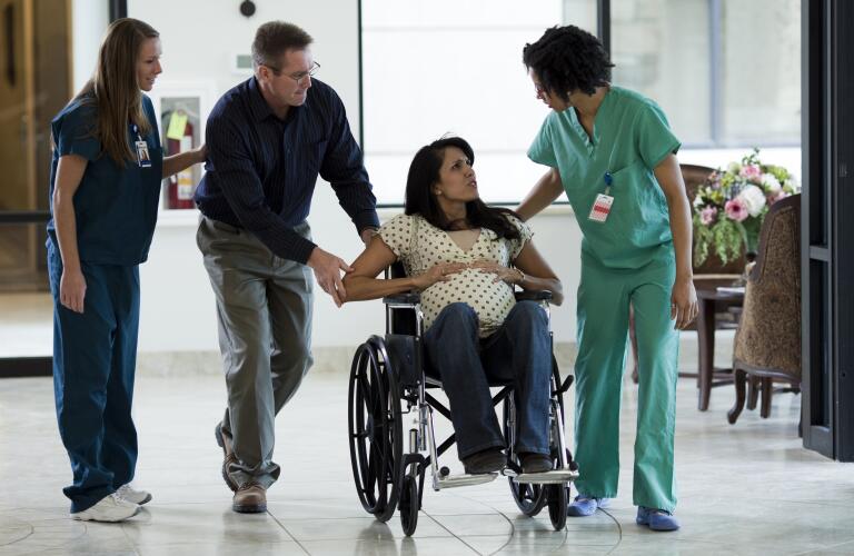 USA, Utah, Payson, Pregnant woman in labor at hospital