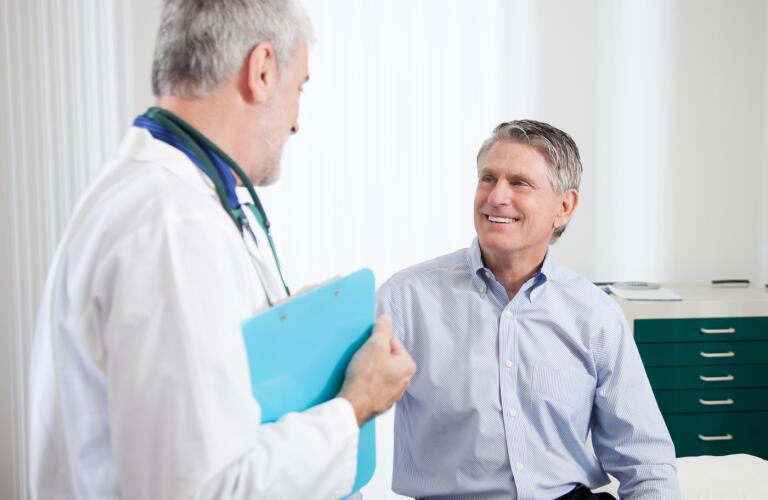 A-doctor-talks-to-a-male-patient