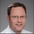 Dr. Timothy West, MD