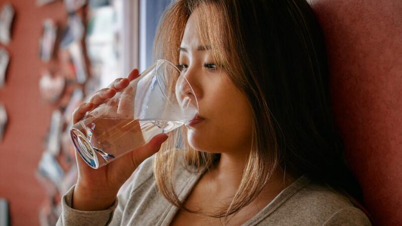 A woman drinking water