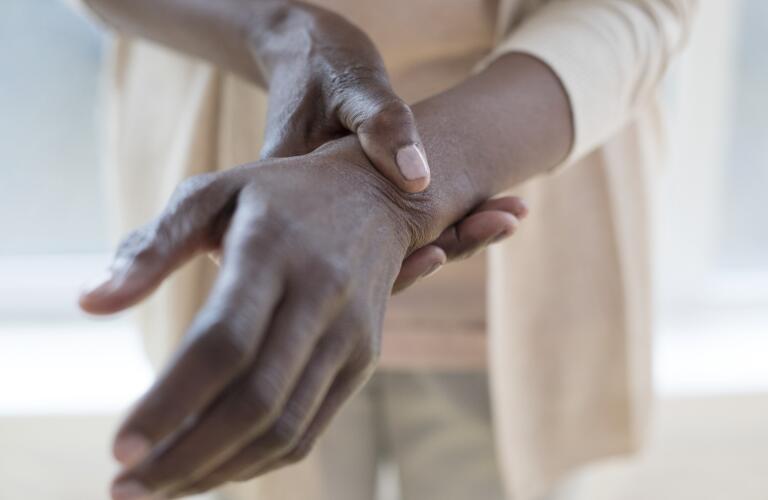 black or african american woman with wrist pain