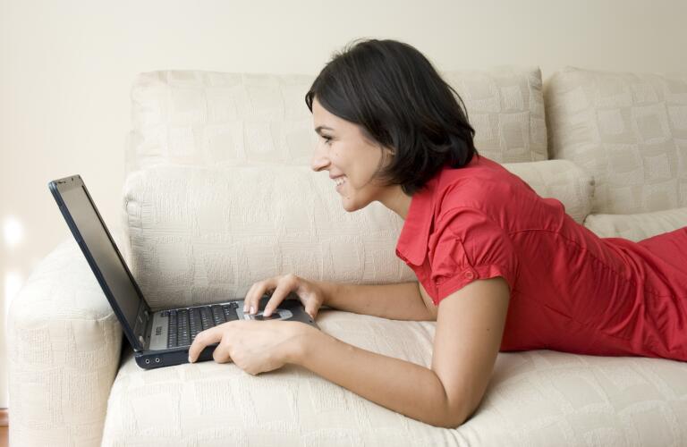 woman-on-couch-on-laptop