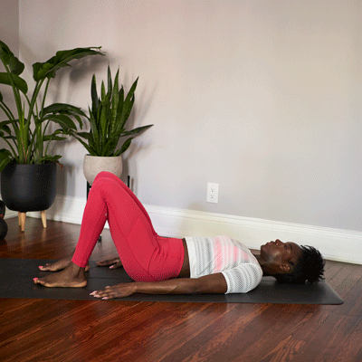 a person is performing bridge pose