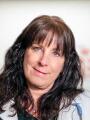 Gretchen Overstolz, NP