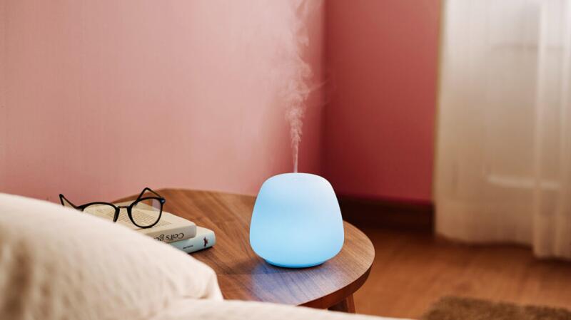oil diffuser on table in bedroom