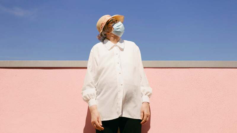 A woman wearing a face mask