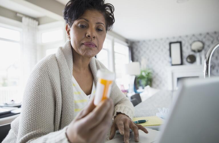 prescription-medication-woman-with-pill-bottle