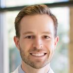 Dr. J Adrian Dennington, DO