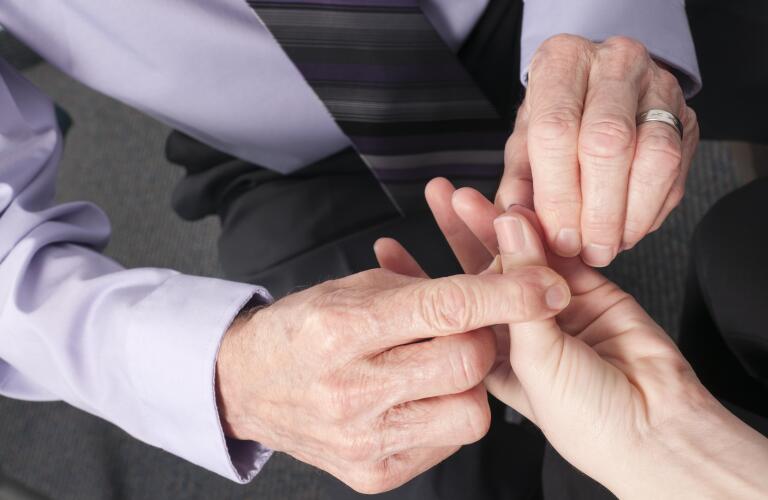 doctor-examining-patients-hand