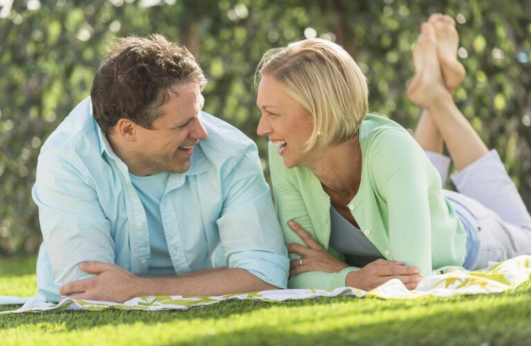 Happy couple on the lawn