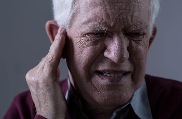 senior-man-with-tinnitus