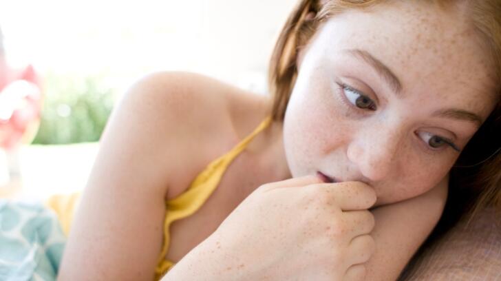 Young Girl Nail Biting