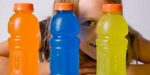 Young Girl Chooses Sports Drink