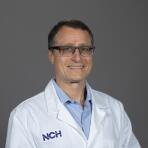 Dr. Lyle Dennis, MD