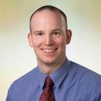 Dr. Michael Wolz, MB ChB