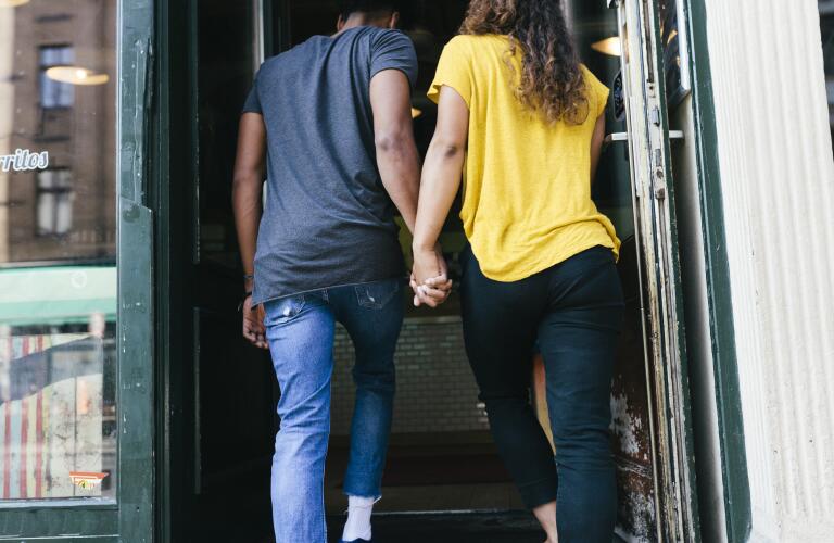 Couple Entering Restaurant Together