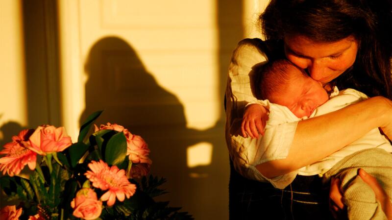 Mother holding baby