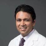 Dr. Madan Joshi, MD