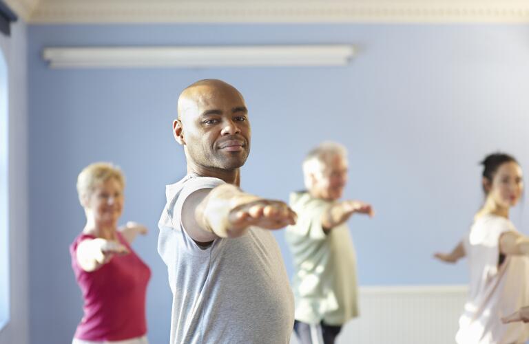 man-in-yoga-class
