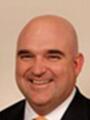 Dr. Thomas Mitchell, MD