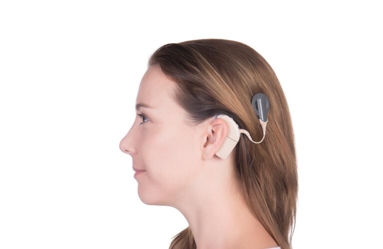 Young woman with cochlear implant