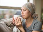 Cancer patient staring out of window