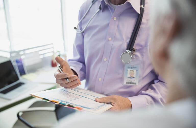 doctor-giving-diagnosis-to-patient