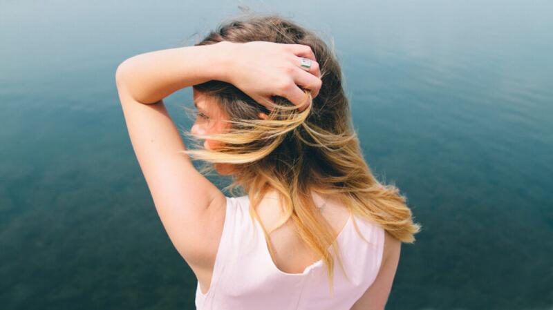 Woman with her hand in her hair