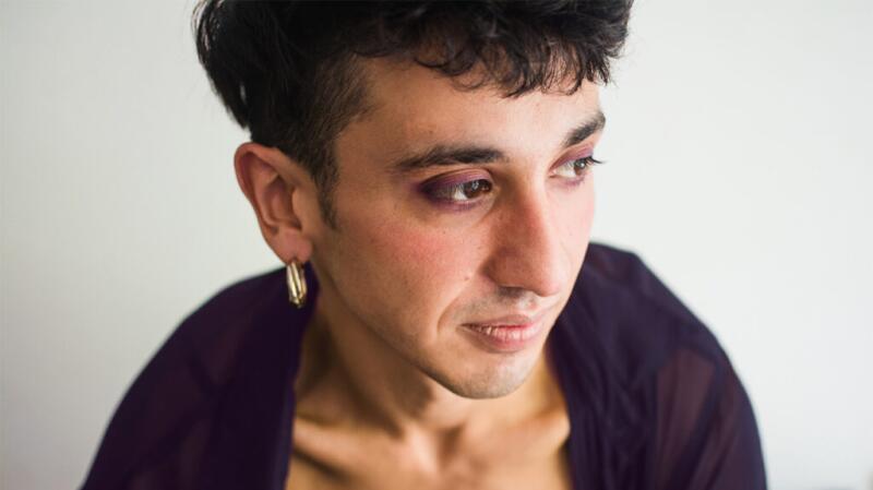 Young person staring off to the side