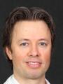 Dr. Christopher Adamson, MD