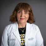 Dr. June Defas, MD