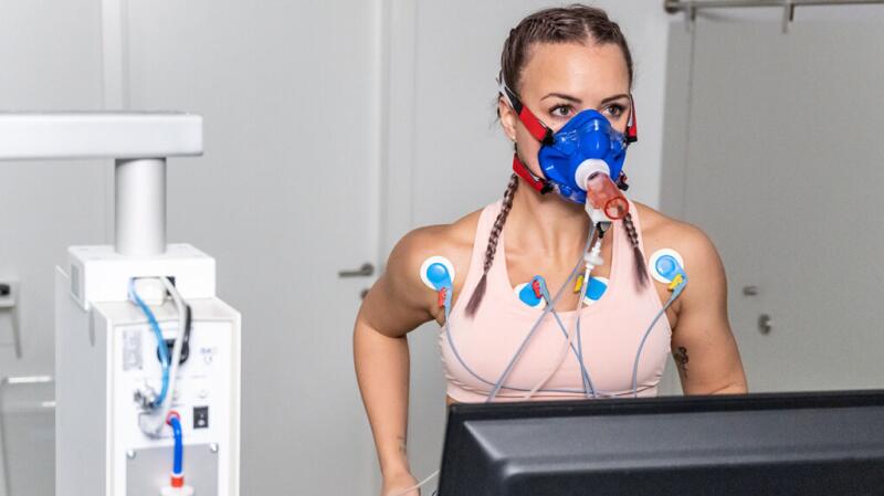 Female running on treadmill during a stress test
