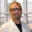 Dr. Travis Carroll, MD