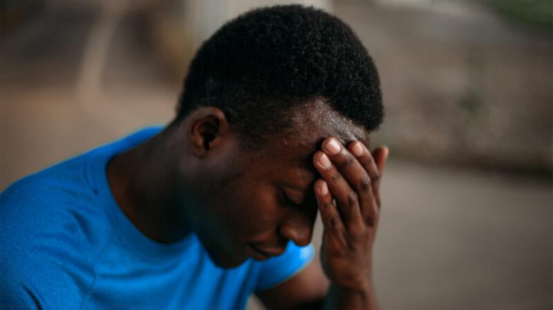 Man holding his head