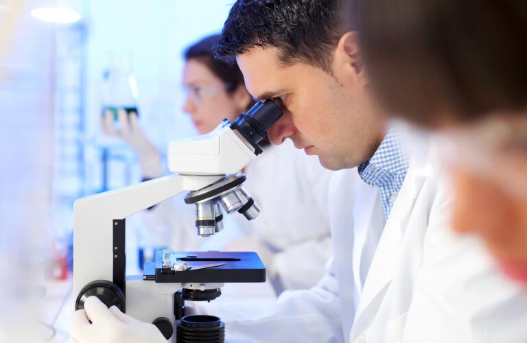doctor using microscope