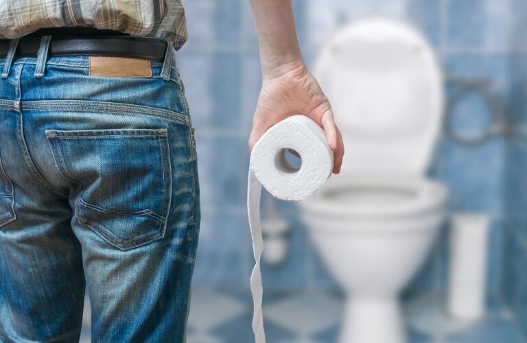 Man with tissue roll
